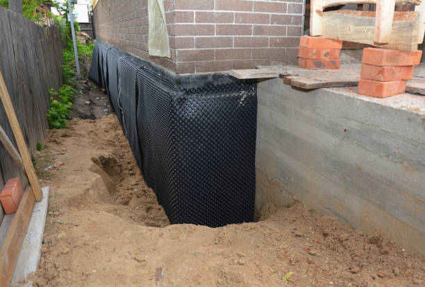 Happy homeowners after waterproofing job in Palo